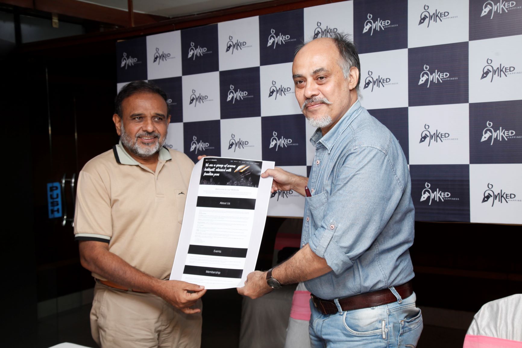 Yusuf Mansoor and Prof Dilip Shah unveiling the website